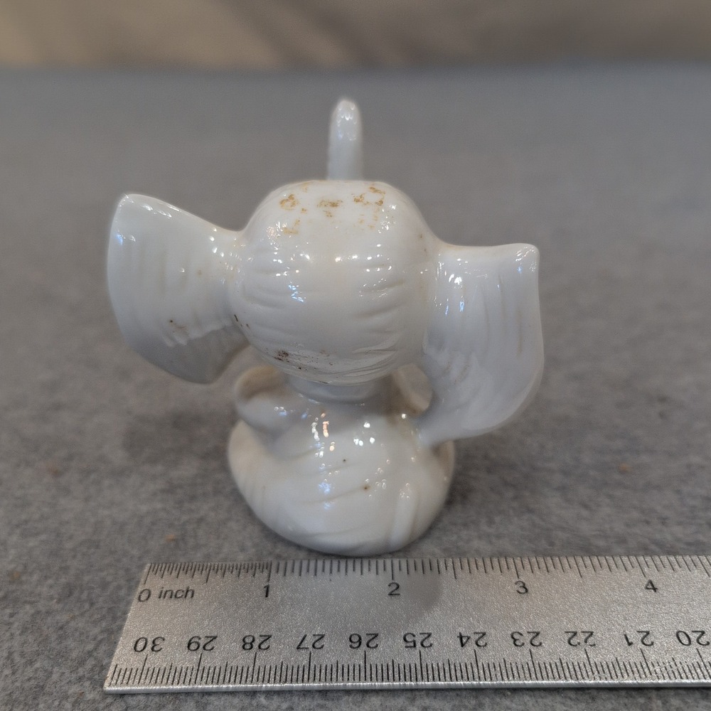 Vintage White Ceramic Elephant Figurine Seated Trunk Up Blue Eyes Bow Tie - Picture 3 of 4